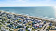 601 Fort Fisher Boulevard S B, Kure Beach, NC 28449 — 4-bedroom waterfront townhome, Kure Beach, NC, photo 1 of 44: 66_drone