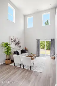 7590 Knightbell Circle, Leland, NC 28451 — 3-bedroom townhome in Ibis Landing, Leland, NC, photo 8 of 56: 18ft Living Room