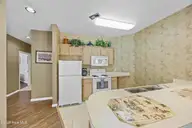213 Kings Trail # 1004, Sunset Beach, NC 28468 — 2-bedroom condo in Sea Trail Plantation, Sunset Beach, NC, photo 11 of 52: 19_kitchen