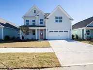 1156 Indigo Bunting Drive Lot 63, Leland, NC 28451 — 4-bedroom home in Indigo Preserve, Leland, NC, photo 1 of 30: IndigoBunting1156-1FDRHL33A6183 copy