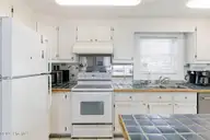 1005 N Anderson Boulevard, Topsail Beach, NC 28445 — 4-bedroom waterfront home, Topsail Beach, NC, photo 16 of 46: 016_1005_n_anderson-16_907