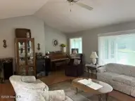 108 Fox Run Court, West End, NC 27376 — 3-bedroom waterfront home in Seven Lakes North, West End, NC, photo 9 of 39: Living Room from front entry