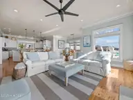 6414 Ocean Drive, Emerald Isle, NC 28594 — 5-bedroom waterfront home in Sea Crest, Emerald Isle, NC, photo 10 of 56: Living room, top floor