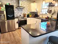 2233 Locksley Woods Drive E, Greenville, NC 27858 — 3-bedroom condo in Locksley Woods, Greenville, NC, photo 5 of 22: Kitchen