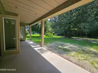203 Gaston Drive, Elizabeth City, NC 27909 — 3-bedroom waterfront home in Newbegun Land, Elizabeth City, NC, photo 15 of 18: Covered Porch View 3