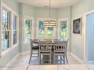 301 Wisteria Way, Caswell Beach, NC 28465 — 3-bedroom home in The Arboretum, Caswell Beach, NC, photo 11 of 39: Breakfast Nook