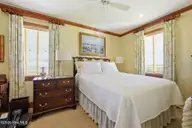 205 Club Colony Drive, Atlantic Beach, NC 28512 — 5-bedroom waterfront home in Club Colony, Atlantic Beach, NC, photo 14 of 38: Primary bedroom