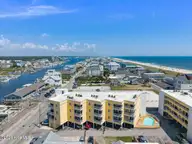 302 Canal Drive Unit 27, Carolina Beach, NC 28428 — 2-bedroom waterfront condo in Beach Harbour, Carolina Beach, NC, photo 1 of 29