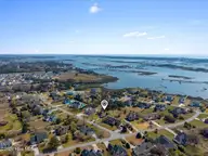 113 Lookout Ridge, Cedar Point, NC 28584 — 3-bedroom home in Magens Bay, Cedar Point, NC, photo 6 of 50: 19-DJI_20260311122706_0055_D_1-HDR-Edit