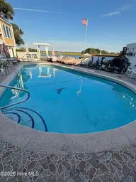 8120 Bald Eagle Lane, Wilmington, NC 28411 — 3-bedroom waterfront home in Porters Neck Plantation, Wilmington, NC, photo 4 of 7: Pool