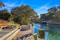 106 Cherry Court, Pine Knoll Shores, NC 28512 — 3-bedroom waterfront home in Pine Knoll Association, Pine Knoll Shores, NC, photo 9 of 63: Canal Front Home in Pine Knoll Shores