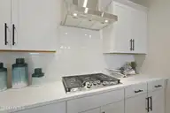 2013 Brisco Way 4, Leland, NC 28451 — 3-bedroom home in Brunswick Forest, Leland, NC, photo 13 of 36: Gas Cooktop