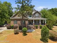 585 Burning Tree Road 10, Pinehurst, NC 28374 — 4-bedroom home in Unit 10, Pinehurst, NC, photo 1 of 71: 585 Burning Tree Rd