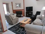 111 Forecastle Court, Washington, NC 27889 — 3-bedroom waterfront townhome in Pamlico Plantation, Washington, NC, photo 8 of 34: View 1 of Living Room