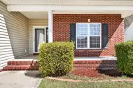 202 Winterlochen Drive, Jacksonville, NC 28540 — 3-bedroom home in Williamsburg Plantation, Jacksonville, NC, photo 4 of 37: Front Porch