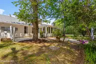 3803 Galantis Drive, Morehead City, NC 28557 — 2-bedroom condo in Woodland Park Condo, Morehead City, NC, photo 6 of 38: Luscious backyard and patio