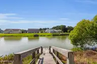 405 Antioch Lakes Road, New Bern, NC 28560 — 3-bedroom waterfront home in The Lakes at Antioch, New Bern, NC, photo 3 of 54: Floating dock on property