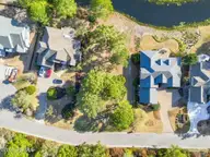 8815 10 Carenden Court, Sunset Beach, NC 28468 — waterfront lot in Thistle Downs, Sunset Beach, NC, photo 12 of 22: DJI_0037