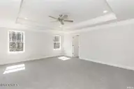 5703 Sloop Court, New Bern, NC 28560 — 4-bedroom home in Fairfield Harbour, New Bern, NC, photo 24 of 49: primary bedroom