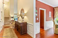 140 Shadow Creek Court, Pinehurst, NC 28374 — 2-bedroom townhome in Villas at Forest Hills, Pinehurst, NC, photo 6 of 39: Foyer to Dining Room