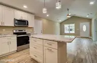 2044 N Tanglewood Drive SW, Supply, NC 28462 — 3-bedroom home in Fairwood, Supply, NC, photo 5 of 33: 3_2 Tandem Kitchen to front room