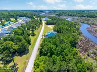 232 1009 Kings Creek Crossing, Holly Ridge, NC 28445 — waterfront lot in Summerhouse On Everett Bay, Holly Ridge, NC, photo 6 of 30: Lot 1009-232 Kings Creek Crossing MLS-7