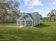 1007 Beauvoir Drive NW, Calabash, NC 28467 — 4-bedroom home in Brunswick Plantation, Calabash, NC, photo 3 of 34: DJI_0009_1