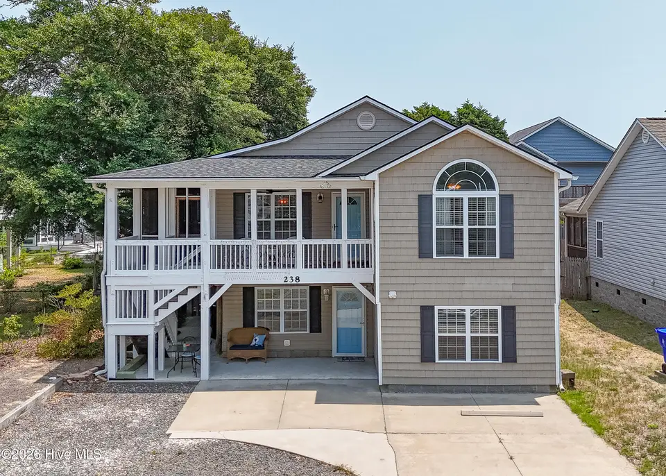238 NE 35th Street, Oak Island, NC 28465 — 5-bedroom home in Tranquil Harbor, Oak Island, NC, photo 1 of 57