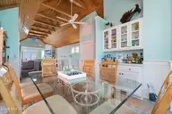 112 Sandpiper Court, Atlantic Beach, NC 28512 — 3-bedroom waterfront home in Sea Dreams, Atlantic Beach, NC, photo 20 of 50: dining area