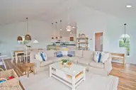 101 Shipwreck Lane E, Emerald Isle, NC 28594 — 3-bedroom waterfront townhome in Spinnakers Reach, Emerald Isle, NC, photo 6 of 38: Living Room