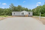 6777 Lewis Drive SE, Winnabow, NC 28479 — 3-bedroom manufactured home in Lewis Acres, Winnabow, NC, photo 2 of 22: 6777 Lewis Dr