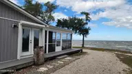 197 Pamlico Parkway, Beaufort, NC 28516 — 3-bedroom waterfront home in Sportsman Village, Beaufort, NC, photo 1 of 77: 197 Pamlico Parkway