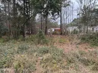 659 40, Bolivia, NC 28422 — waterfront lot in Sunset Harbor, Bolivia, NC, photo 1 of 3: Street View