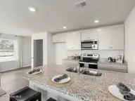 4326 Majesty Drive Unit 353, Castle Hayne, NC 28429 — 4-bedroom townhome in Sidbury Station, Castle Hayne, NC, photo 12 of 37: 11- similar to kitchen 3