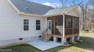 69 N Rippling Court, Smithfield, NC 27577 — 3-bedroom home in Waterview, Smithfield, NC, photo 7 of 28: Screened Porch