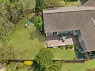 206 W Azalea Drive, Holly Ridge, NC 28445 — 3-bedroom home in Neighborhoods of Holly Ridge, Holly Ridge, NC, photo 22 of 23: Backyard