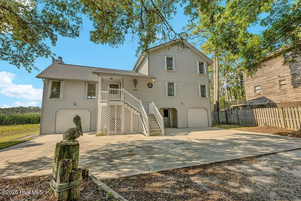 2902 W Yacht Drive, Oak Island, NC 28465 — 4-bedroom waterfront home, Oak Island, NC, photo 1 of 58: 003_img_0783_14
