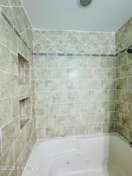 820 Cedar Point Circle, Elizabeth City, NC 27909 — 3-bedroom home in Briarwood, Elizabeth City, NC, photo 16 of 29: Hall Bath Jetted tub/Tiled surround
