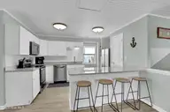 1115 N Shore Drive, Surf City, NC 28445 — 7-bedroom waterfront home in Del Mar Beach, Surf City, NC, photo 24 of 59