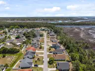 5014 N Hampton Drive SE, Southport, NC 28461 — 3-bedroom home in Carolina Place, Southport, NC, photo 7 of 63: 7-web-or-mls-DJI_20260415124151_0399_D