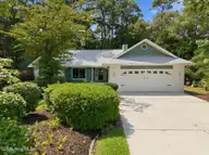 933 Green Pointe Drive, Sunset Beach, NC 28468 — 3-bedroom home in Sea Trail Plantation, Sunset Beach, NC, photo 1 of 63