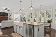 749 Pickering Drive NW, Calabash, NC 28467 — 5-bedroom home in Spring Mill, Calabash, NC, photo 20 of 48: View to back of Home from the kitchen