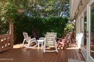 579 Coral Ridge Road, Pine Knoll Shores, NC 28512 — 4-bedroom waterfront home in Beacon's Reach, Pine Knoll Shores, NC, photo 18 of 62: Spacious Outdoor Deck