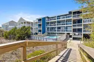 608 N Carolina Beach Avenue N Unit 1b, Carolina Beach, NC 28428 — 3-bedroom waterfront condo in Reefs, Carolina Beach, NC, photo 2 of 27: photo_02