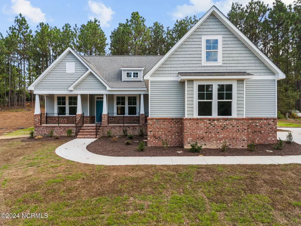 17 Woodland Circle, Jackson Springs, NC 27281 — 4-bedroom home in Foxfire Village East, Jackson Springs, NC, photo 1 of 42: 2-web-or-mls-DJI_20240716082221_0625_D