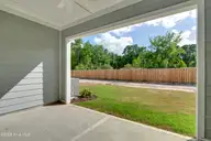 2209 Star Shower Way, Leland, NC 28451 — 4-bedroom townhome in Grand Park, Leland, NC, photo 18 of 34: Covered Porch