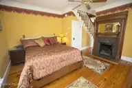 122 S Academy Street, Washington, NC 27889 — 2-bedroom home in Historic District, Washington, NC, photo 18 of 77: Master Bedroom with Fireplace