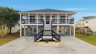 2010 N New River Drive, Surf City, NC 28445 — 3-bedroom home in Old Settlers Beach, Surf City, NC, photo 1 of 49: 1_dji_20251121103904_0053_d