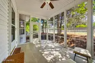 1235 Burning Tree Road 12, Pinehurst, NC 28374 — 3-bedroom home in Unit 12, Pinehurst, NC, photo 18 of 24: 3-season porch