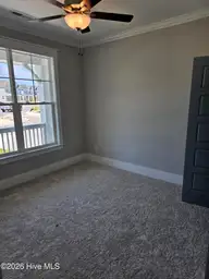 371 Longhill Drive, Wilmington, NC 28412 — 3-bedroom home in Riverlights, Wilmington, NC, photo 14 of 16: Guest Bed